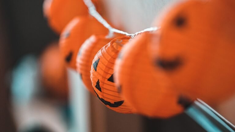 Shop Small Halloween: The Real $22 Billion Reason to Buy Local 5 orange jack-o'-lantern paper string lights close-up