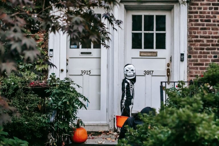 Halloween Spending 2026: 4 Proven Decorating Ideas Everyone Loves 9 trick-or-treater in skeleton costume during halloween spending season
