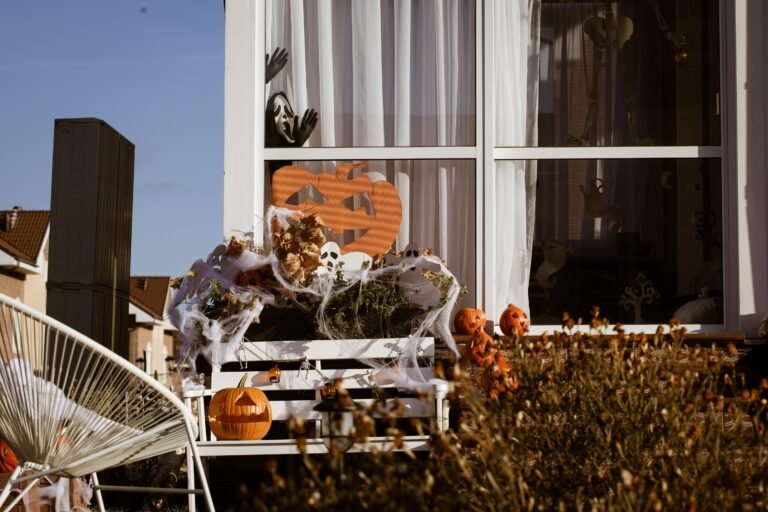 Halloween Decorating: 4 Foolproof, Damage-Free Zones to Style 10 Halloween decorating window and porch display with pumpkins